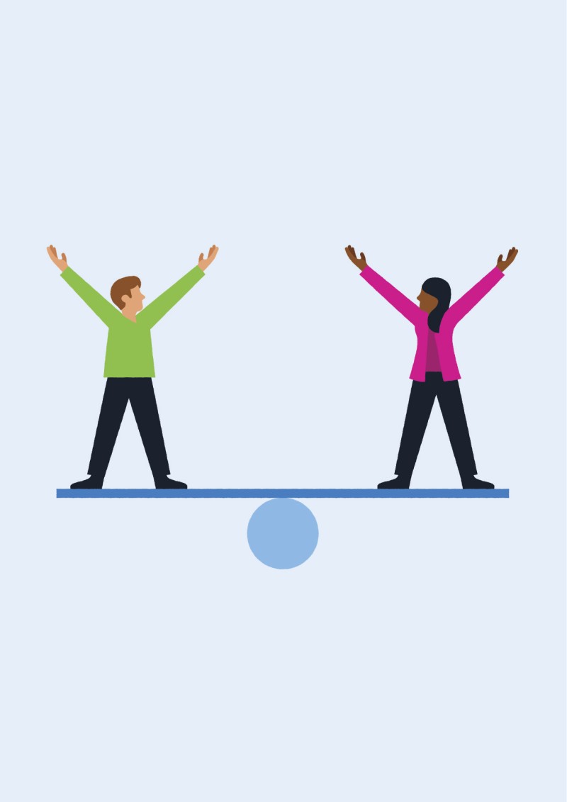Female and male balancing on a seesaw