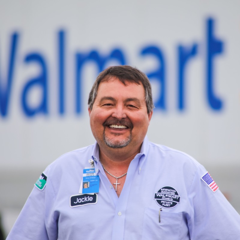 A smiling truck driver