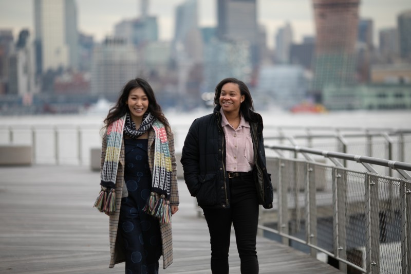 2 associates walking together