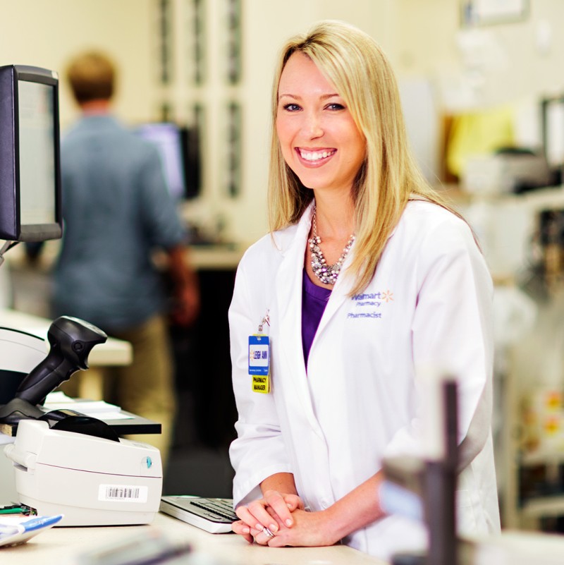 Walmart Pharmacist In Front of Walmart Pharmacy